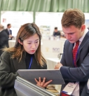 Our team member explained to visitor how to operate HRVMS in tablet.
